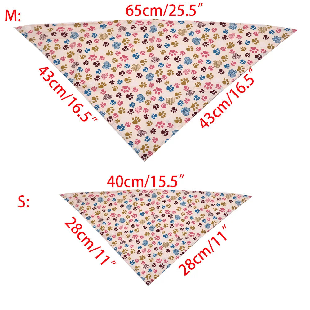 Two triangular bandanas with floral pattern and measurements on a white background