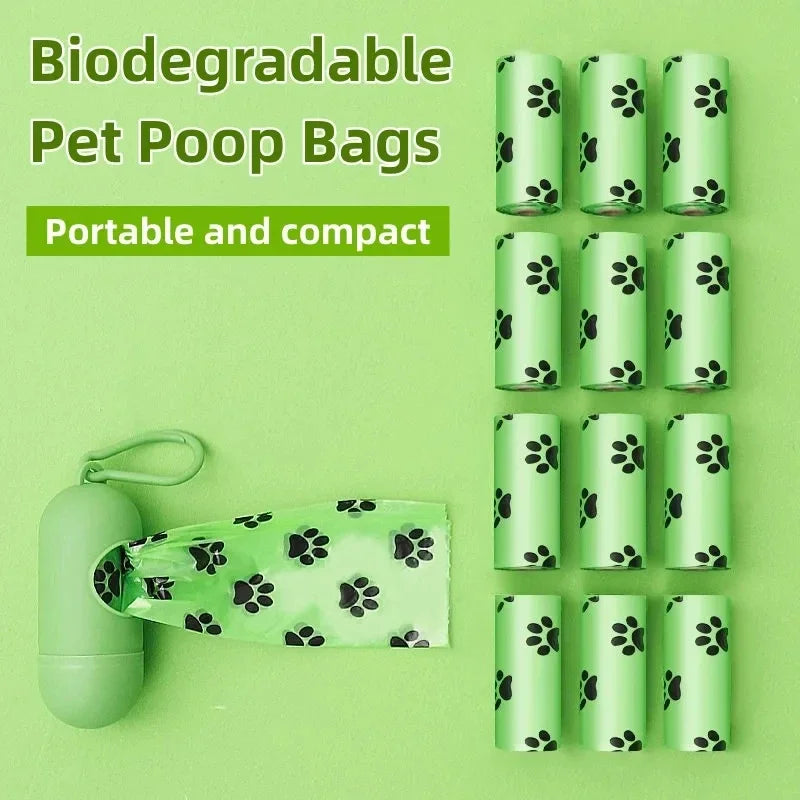 Biodegradable pet poop bags with a green holder on a green background