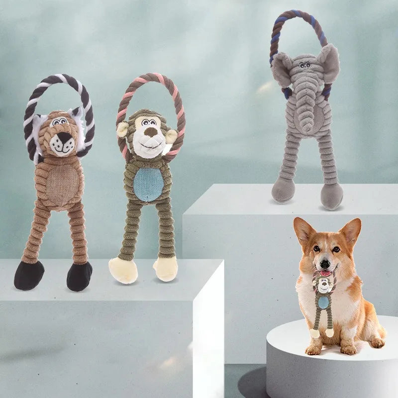 Three plush dog toys on stands with a dog wearing a toy around its neck.