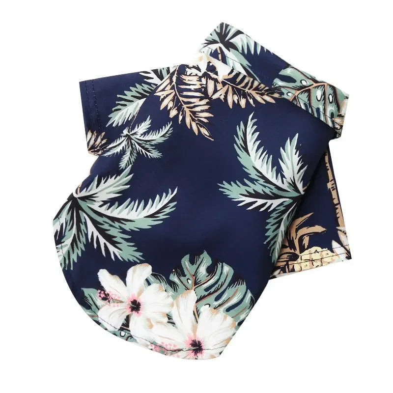 Navy blue fabric with tropical leaf and flower pattern on a white background