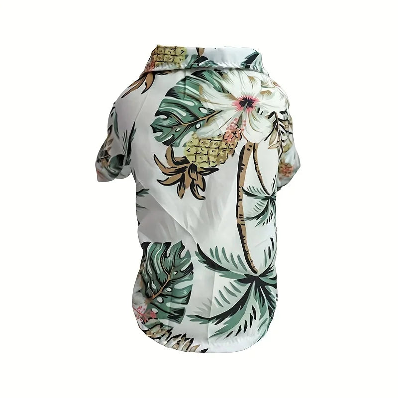 Hawaiian shirt with tropical leaf and pineapple design on a white background