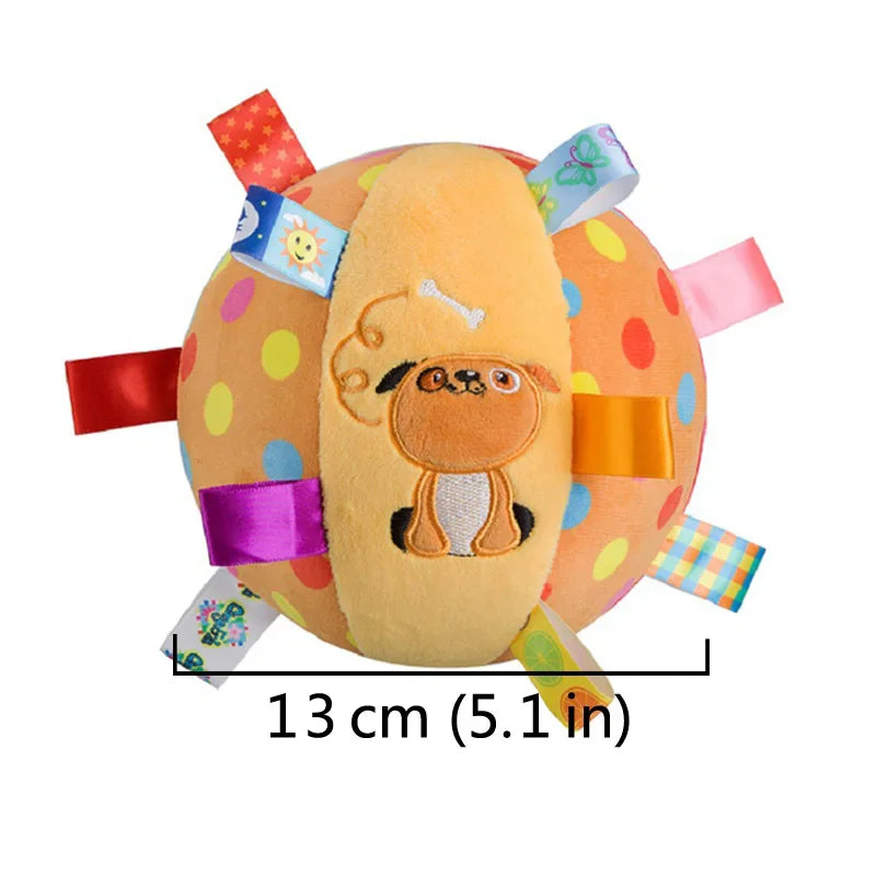 Round plush toy with colorful tags and a measurement label on a white background